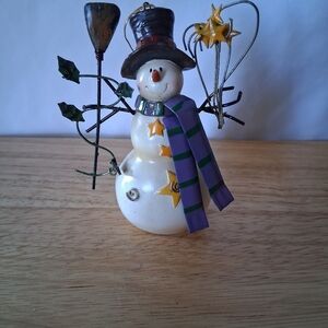 Charming Snowman Ornament with Purple and Gold Accents